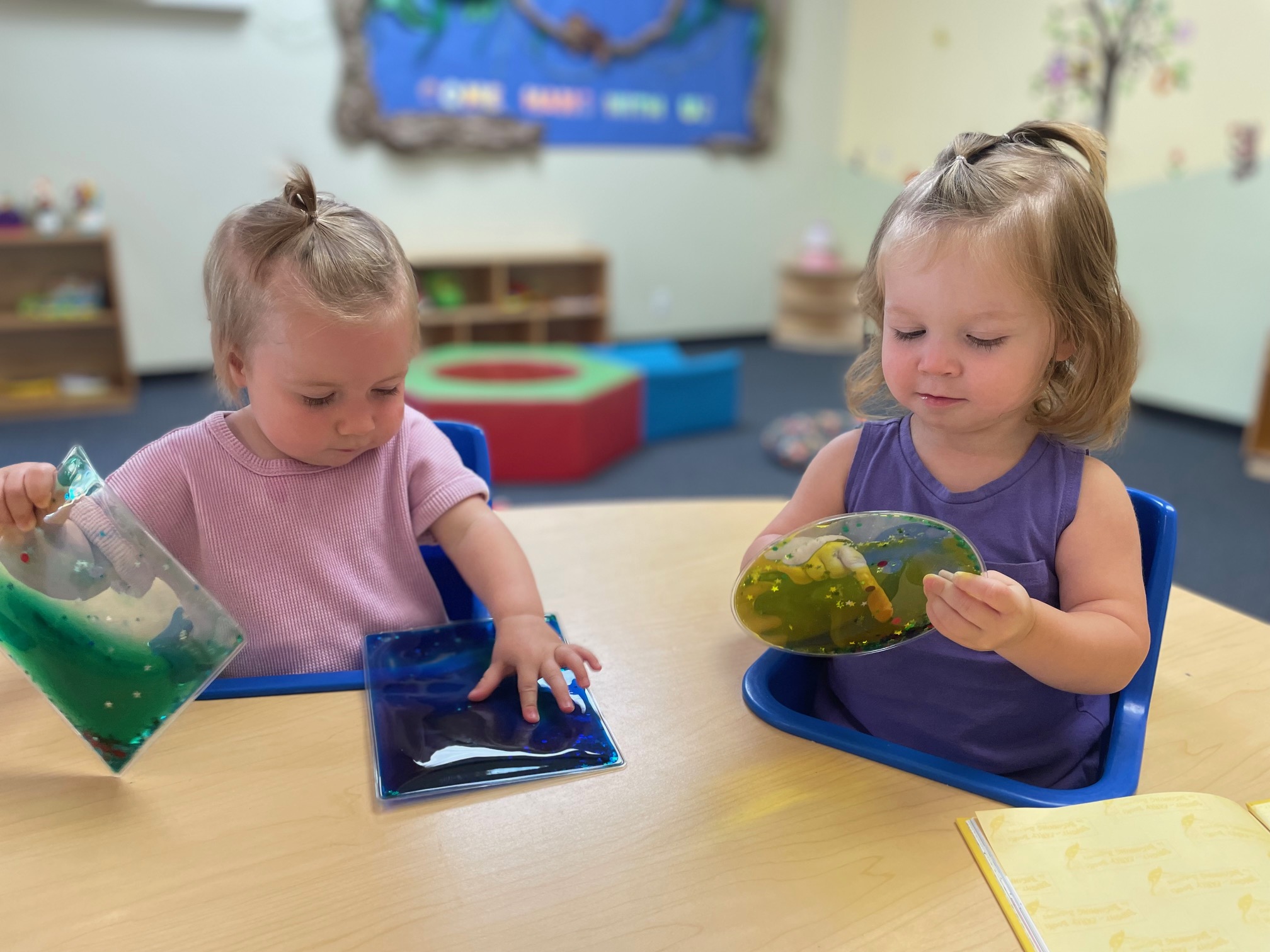 Children reading books independently and in groups at Yorba Linda Montessori